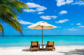 Beach vacation with two chairs at a beautiful beach.