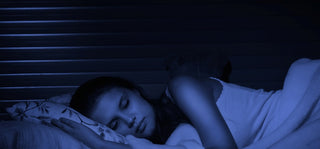 A woman Sleeping in peace by using techniques in the Sleep Toolbox.